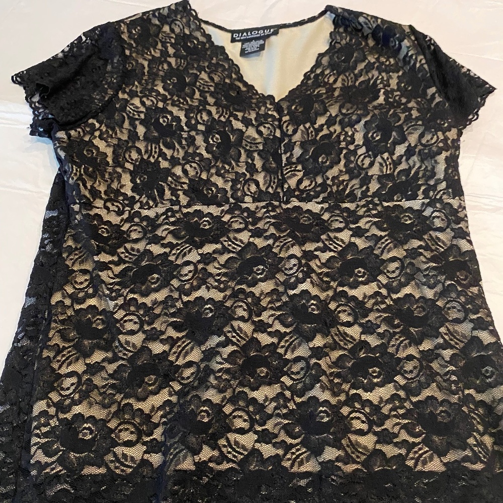 Slightly worn black lace top short sleeve fully lined